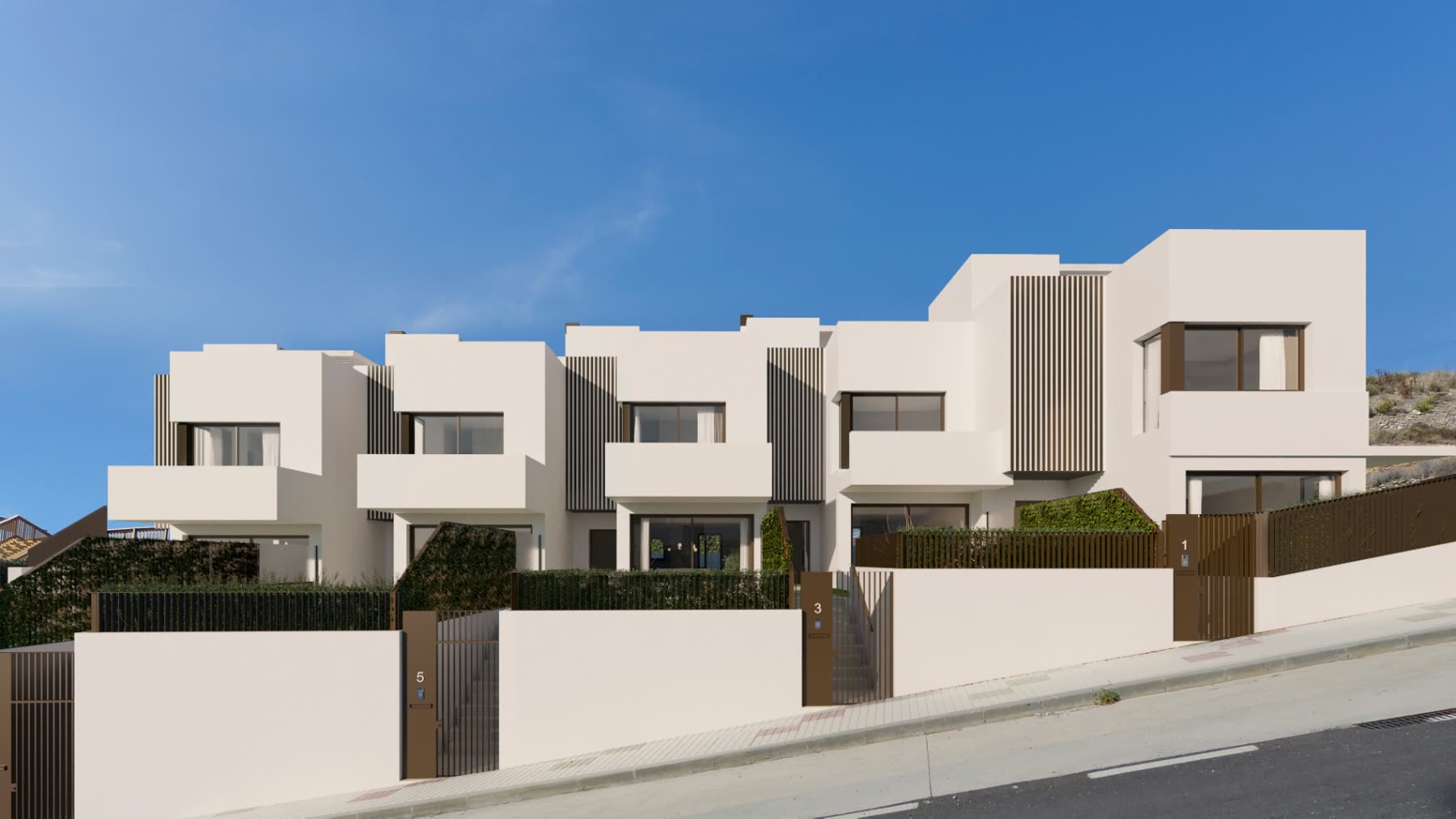 Fachada de los chalets adosados de obra nueva