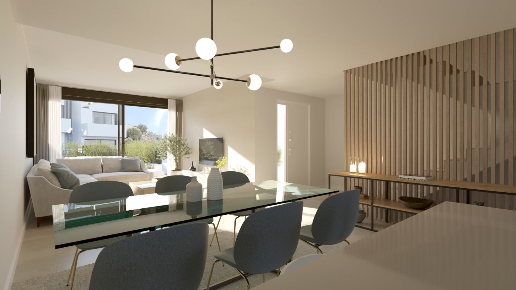 Salón comedor con doble altura de luz y salida a jardín